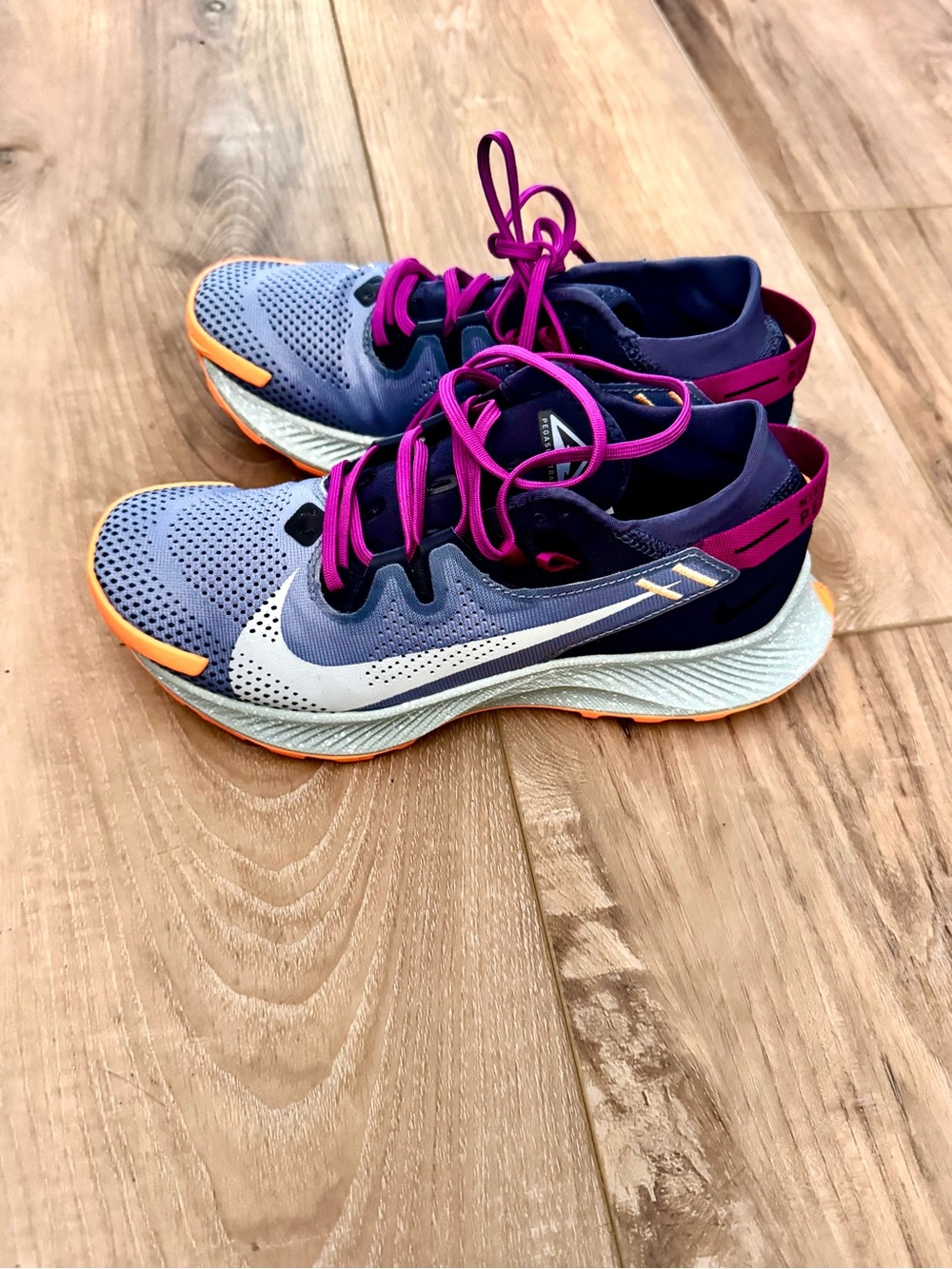 Nike Women's Purple Athletic Shoes with Pink Laces and Orange Accents